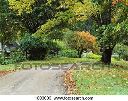 Stock Image - Country road in Vermont, USA. Fotosearch