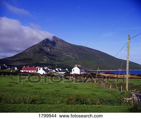 Picture - Doogort Village and Slievemore Mountain on Achill Island in County Mayo, Ireland. Fotosearch