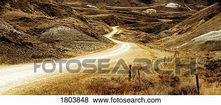 Stock Photo - Empty curving road. Fotosearch
