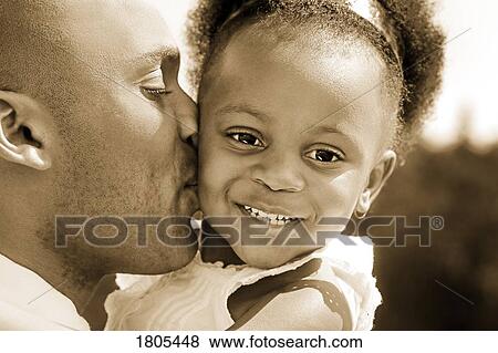 Father kissing daughter View Large Photo Image Stock Photo - Father kissing daughter. Fotosearch