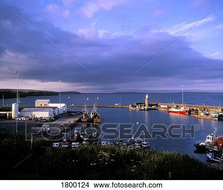 Picture - Fishing harbour in Dunmore East, County Waterford, Ireland. Fotosearch