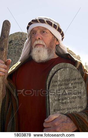 Front view of a senior man holding cane and the 10 commandments View Large Photo Image Stock Photo - Front view of a senior man holding cane and the 10 commandments. Fotosearch