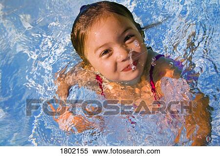 Stock Photography - Girl in swimming pool . Fotosearch