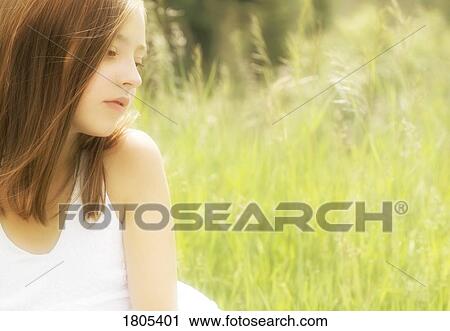 Girl sitting in the park View Large Photo Image Stock Image - Girl sitting in the park. Fotosearch