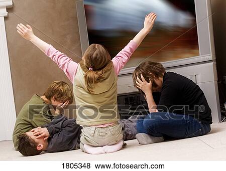 Girl winning a video game View Large Photo Image Stock Photo - Girl winning a video game. Fotosearch