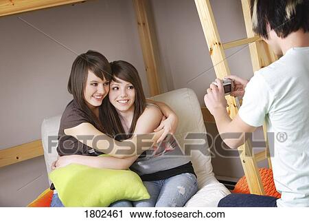 Girls having their picture taken View Large Photo Image Stock Image - Girls having their picture taken. Fotosearch