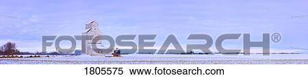 Stock Photography - Grain elevator in early winter field, Morinville, Alberta, Canada. Fotosearch