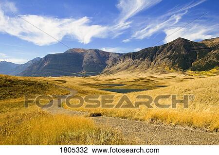 Grassland, lakes and mountains in Waterton Lakes Park View Large Photo Image Stock Image - Grassland, lakes and mountains in Waterton Lakes Park . Fotosearch