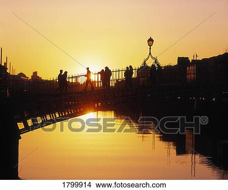 Ha'penny Bridge at Sunset in Dublin, Ireland View Large Photo Image Picture - Ha'penny Bridge at Sunset in Dublin, Ireland. Fotosearch