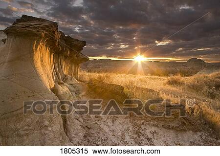 Hoodoos at sunset in Dinosaur Provincial Park, Alberta, Canada View Large Photo Image Stock Photography - Hoodoos at sunset in Dinosaur Provincial Park, Alberta, Canada . Fotosearch
