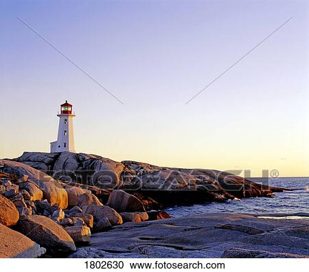 Stock Image - Lighthouse on Peggy's Cove, Nova Scotia. Fotosearch