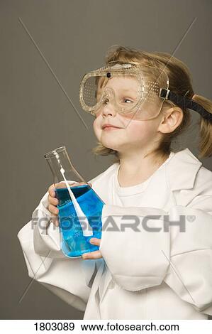 Little girl with safety goggles and science beaker View Large Photo Image Stock Photo - Little girl with safety goggles and science beaker. Fotosearch
