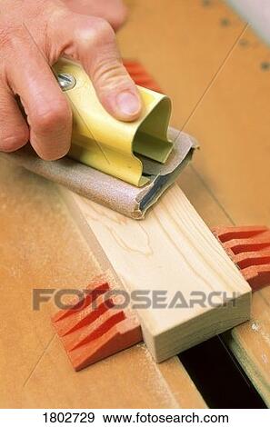 Man sanding wood View Large Photo Image Stock Photo - Man sanding wood. Fotosearch