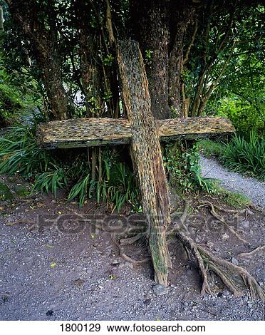 Stock Photo - Money offering in a cross in Gougane Barra, County Cork, Ireland. Fotosearch