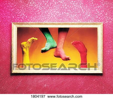 Painted bare feet behind a frame View Large Photo Image Stock Photo - Painted bare feet behind a frame. Fotosearch