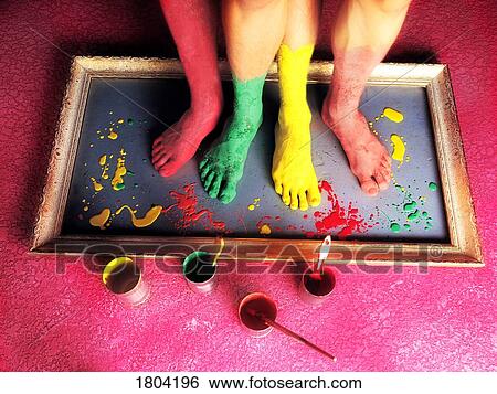 Painted bare feet standing on a picture frame View Large Photo Image Stock Photograph - Painted bare feet standing on a picture frame. Fotosearch