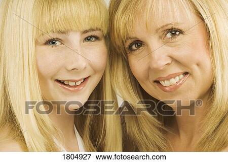 Portrait of a mother and daughter View Large Photo Image Stock Photo - Portrait of a mother and daughter. Fotosearch