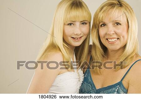 Stock Photograph - Portrait of a mother and daughter. Fotosearch