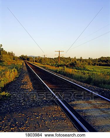 Railroad tracks, Eastern townships, Quebec, Canada View Large Photo Image Picture - Railroad tracks, Eastern townships, Quebec, Canada. Fotosearch