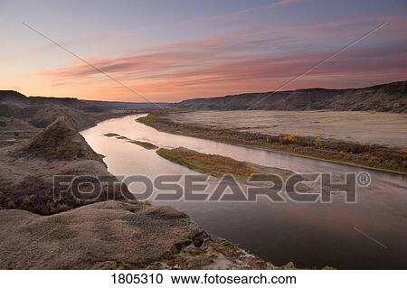 Stock Image - Red Deer River before sunrise in Alberta, Canada . Fotosearch