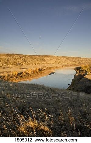 Stock Image - Red Deer River in early morning. Fotosearch