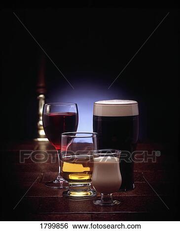 Stock Photograph - Round of Drinks at a traditional Irish Pub, Ireland. Fotosearch