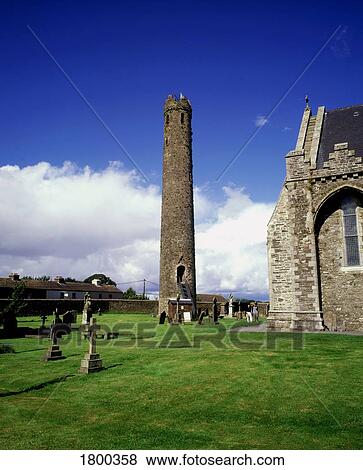 Stock Photo - Round Tower and St Brigid's Cathedral in Kildare town, County Kildare, Ireland. Fotosearch