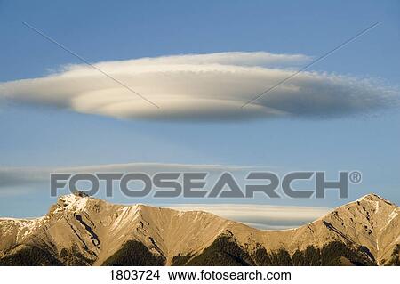 Saucer-shaped cloud, Kootenay Plains, Alberta, Canada View Large Photo Image Picture - Saucer-shaped cloud, Kootenay Plains, Alberta, Canada . Fotosearch