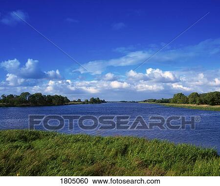 Stock Image - Shannon Waterway Looking North from Portumna Bridge, Co Leitrim, Ireland. Fotosearch