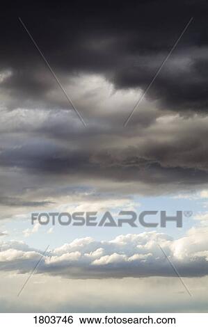 Stock Photograph - Storm clouds in the sky. Fotosearch