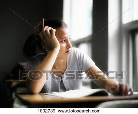 Student bored with school work View Large Photo Image Stock Photo - Student bored with school work. Fotosearch