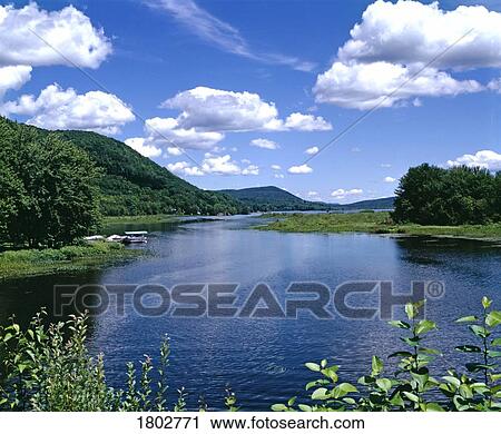 Stock Image - Summer river landscape. Fotosearch