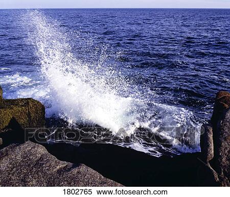 Stock Photography - Wave crashing on shoreline. Fotosearch