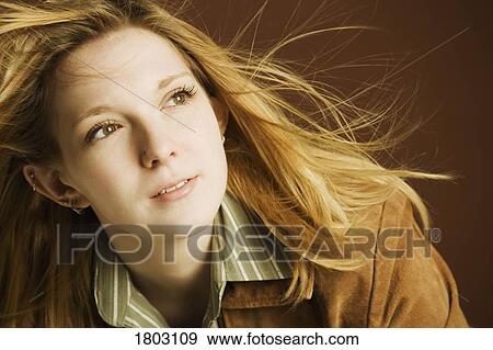 Woman in the wind View Large Photo Image Stock Photo - Woman in the wind. Fotosearch