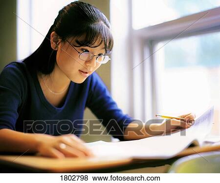 Stock Photo - Woman reading. Fotosearch