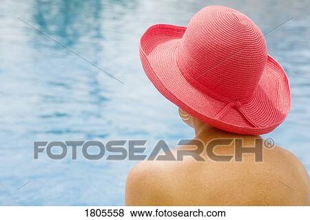Woman wearing a hat View Large Photo Image Stock Photo - Woman wearing a hat. Fotosearch