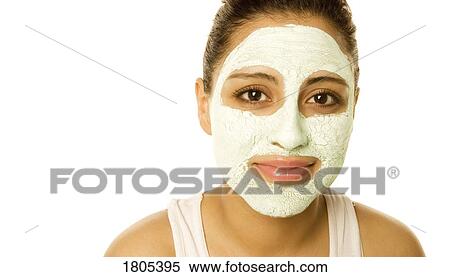 Woman with a facial mask View Large Photo Image Stock Photography - Woman with a facial mask. Fotosearch