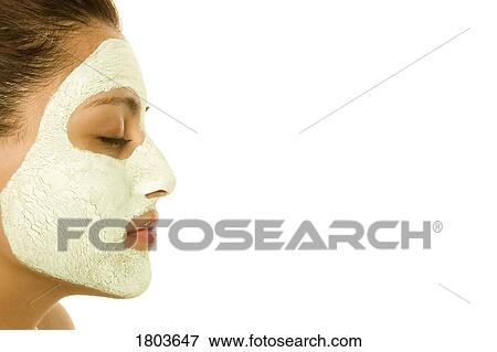 Woman with facial mask View Large Photo Image Stock Photo - Woman with facial mask. Fotosearch
