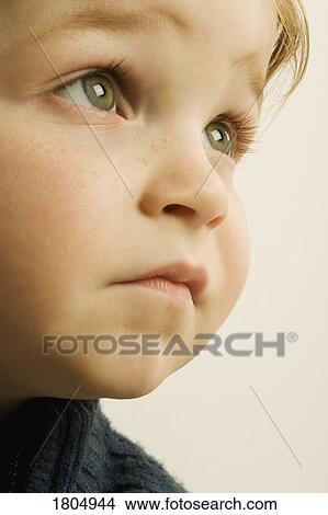 Young boy gazing View Large Photo Image Picture - Young boy gazing. Fotosearch