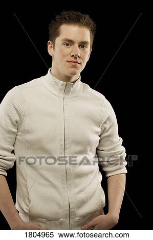 Young man wearing a zippered sweater View Large Photo Image Stock Photography - Young man wearing a zippered sweater. Fotosearch