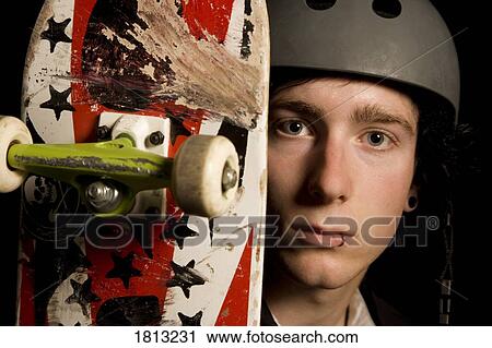 Stock Image - A male skateboarder. Fotosearch