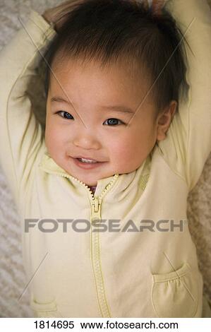 Stock Photography - Asian baby smiling. Fotosearch