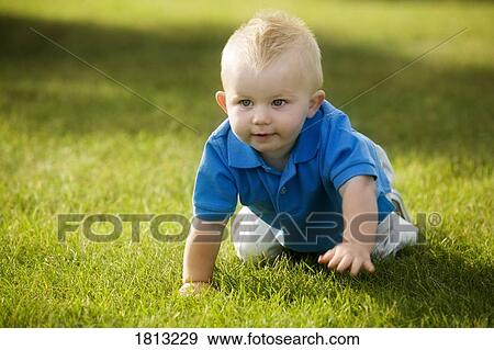 Stock Photo - Baby crawling. Fotosearch