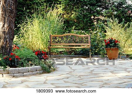 Bench in a garden setting View Large Photo Image Stock Image - Bench in a garden setting. Fotosearch