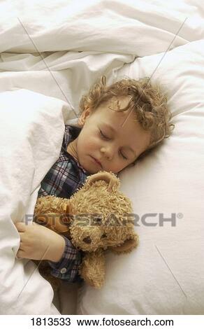 Boy sleeping with teddy bear View Large Photo Image Stock Image - Boy sleeping with teddy bear. Fotosearch