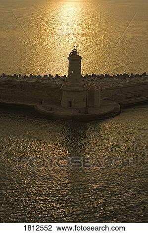 Breakwater Lighthouse, Port of Livorno, Tuscany, Italy View Large Photo Image Stock Image - Breakwater Lighthouse, Port of Livorno, Tuscany, Italy . Fotosearch