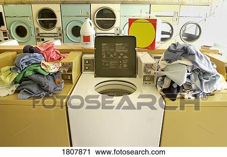 Busy laundromat View Large Photo Image Stock Image - Busy laundromat. Fotosearch