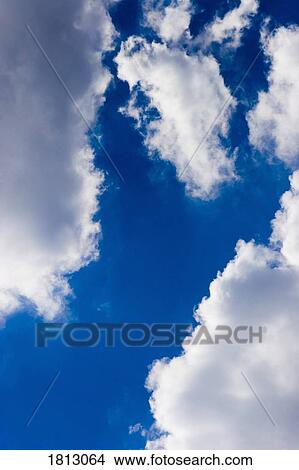 Clouds and blue sky View Large Photo Image Picture - Clouds and blue sky. Fotosearch