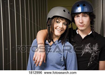 Stock Photograph - Couple of teenagers. Fotosearch