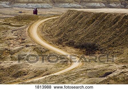 Stock Photo - Empty curving road. Fotosearch